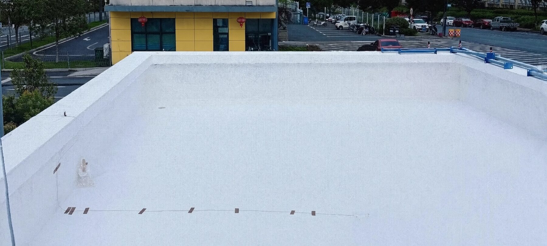Envelope coating on a roof deck